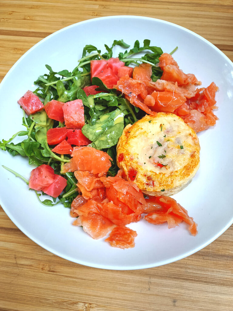 Serving sample of arugula, beets, smoked salmon and Anja's Egg and Potato muffin.